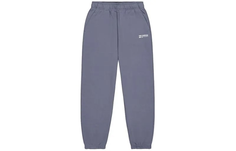 Трикотажные спортивные штаны женские фиолетовые New Balance