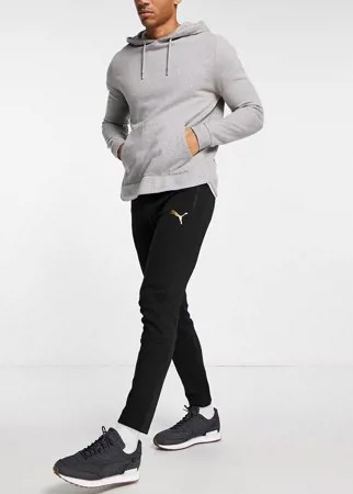 Черные джоггеры с золотистым принтом пантеры Puma Evostripe-Черный цвет