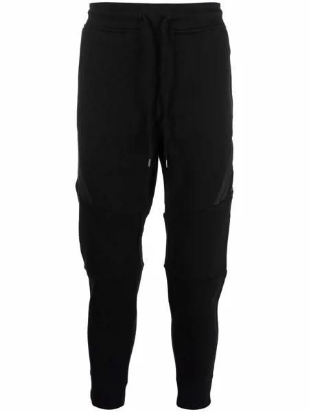 C.P. Company зауженные спортивные брюки с декором Lens
