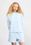 Свитер LINEAR HERITAGE BRUSHED BACK CREWNECK New Balance, светло-синий