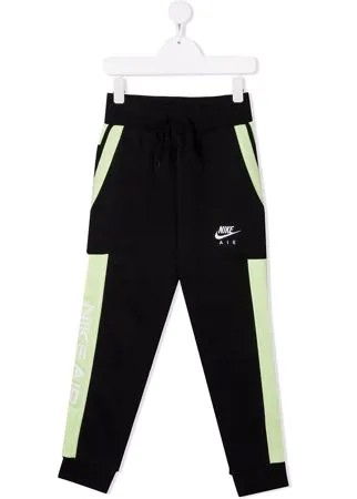 Nike спортивные брюки с лампасами