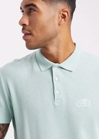 Поло из вафельного трикотажа с вышивкой на груди ASOS DESIGN-Зеленый цвет