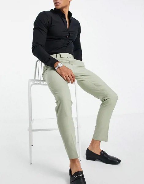 Бледно-зеленые брюки зауженного кроя ASOS DESIGN-Зеленый цвет
