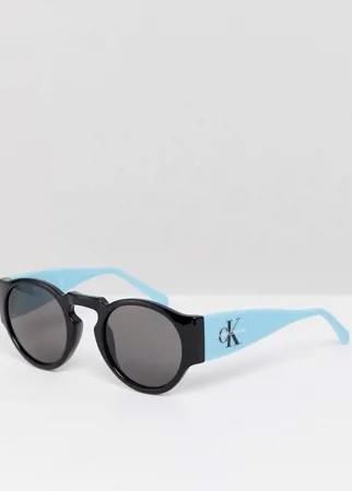 Круглые солнцезащитные очки Calvin Klein Jeans CKJ18500S-Черный