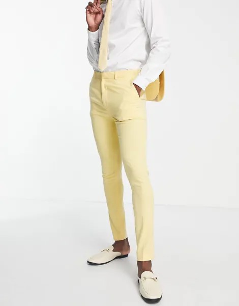 Желтые брюки суперскинни ASOS DESIGN