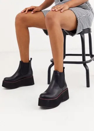 Черные ботинки из искусственной кожи на платформе с красными швами Koi Footwear-Черный
