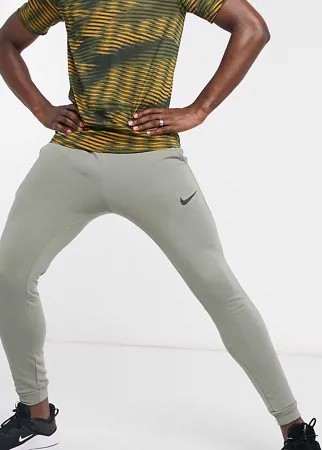 Суженные книзу джоггеры цвета хаки Nike Training Tall Dry-Зеленый цвет