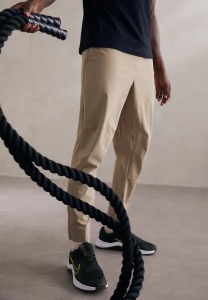 Спортивные брюки UNLIMITED TPR Nike, хаки/черный/(светоотражающий серебристый)