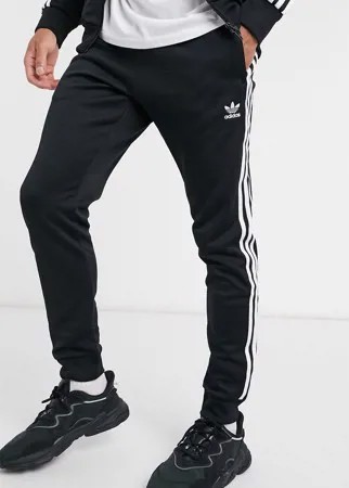 Черные зауженные джоггеры с тремя полосками adidas Originals adicolor-Черный цвет