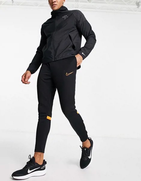 Черные с оранжевым джоггеры Nike Football Academy-Черный цвет