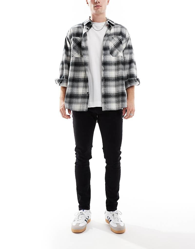 Черные зауженные джинсы Jack & Jones Pete