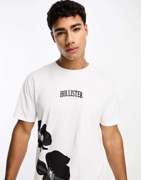 Белая футболка с цветочным принтом и логотипом Hollister