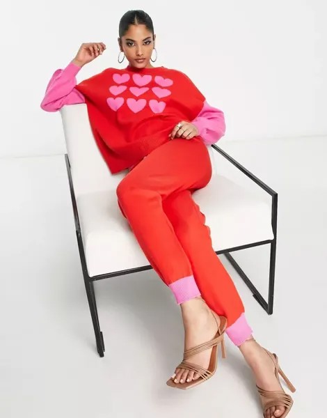 Красные контрастные трикотажные брюки Never Fully Dressed с розовыми вставками