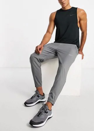 Серые тканевые джоггеры Nike Running Challenger Dri-FIT-Серый