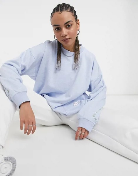 Бледно-голубой лонгслив Nike MOVE TO ZERO