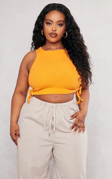 PrettyLittleThing Укороченный жилет с кулиской и рюшами по бокам оранжевого цвета в рубчик