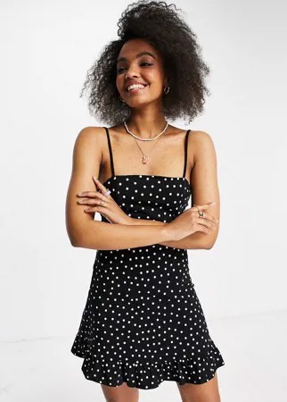 Черный сарафан в белый горошек на бретельках с оборкой по краю ASOS DESIGN-Черный цвет