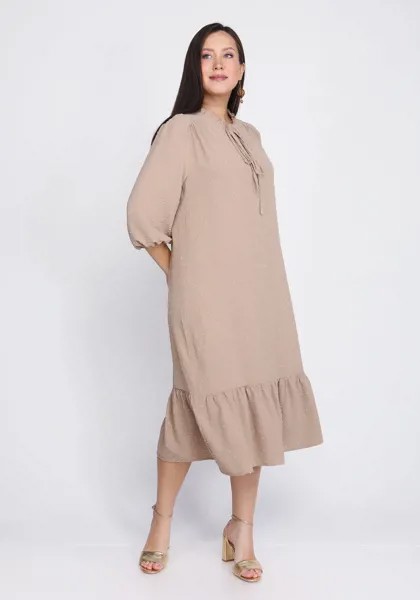 Платье из фактурной ткани с воланом