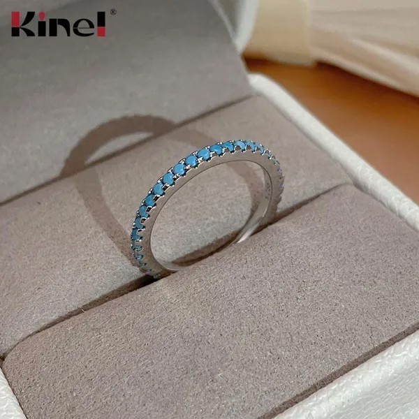 Kinel Slim Простое кольцо серебристого цвета с синим камнем