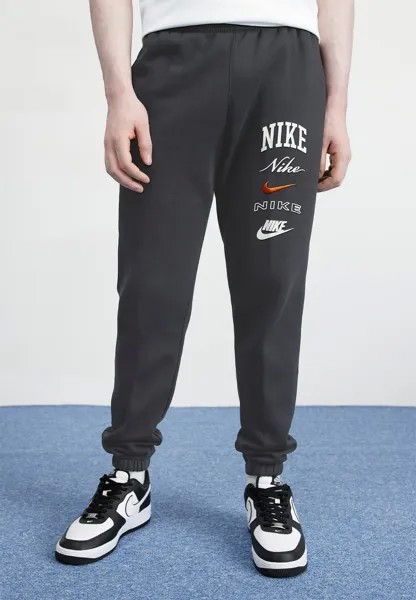Спортивные брюки Club Pant Stack Nike, цвет black/sail/safety orange