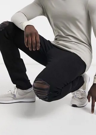 Черные зауженные джинсы с рваными коленями Another Influence-Черный цвет