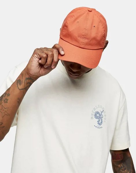 Оранжевая мягкая кепка с надписью 