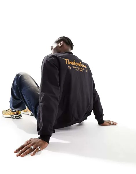 Черный университетский бомбер Timberland с принтом на спине