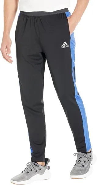 Приобретите трикотажные джоггеры The Run Astro adidas, цвет Black/Team Royal Blue