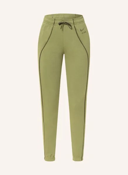 Спортивные брюки женские Nike 1001307482 зеленые M (доставка из-за рубежа)