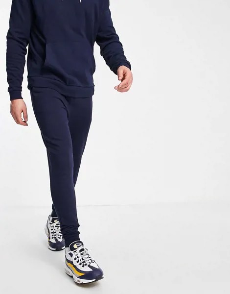Темно-синие джоггеры скинни из органического хлопка ASOS DESIGN-Темно-синий