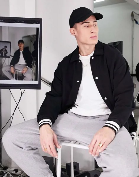 Черный oversized-бомбер из трикотажа ASOS DESIGN