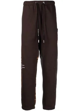 AAPE BY *A BATHING APE® зауженные спортивные брюки в технике пэчворк