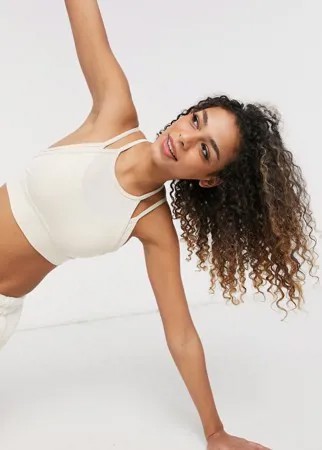 Многослойный спортивный бюстгальтер кремового цвета с легкой степенью поддержки Nike Yoga Indy-Белый