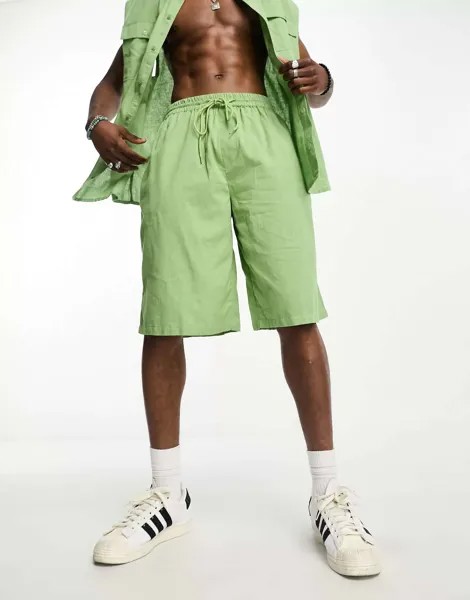 Светло-зеленые льняные пляжные шорты COLLUSION