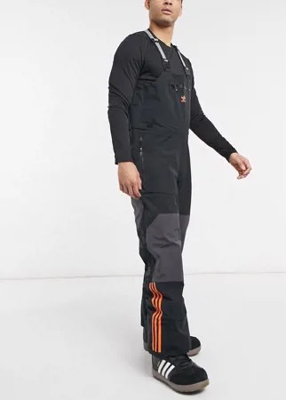 Черные зимние брюки-комбинезон adidas Snowboarding 3L-Черный цвет