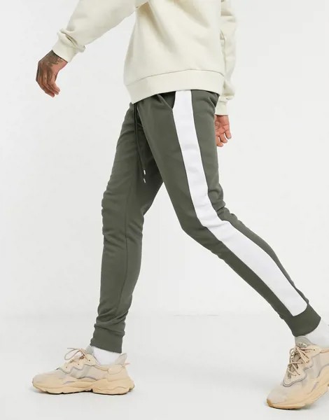 Зауженные джоггеры цвета хаки с полосками по бокам ASOS DESIGN-Зеленый цвет