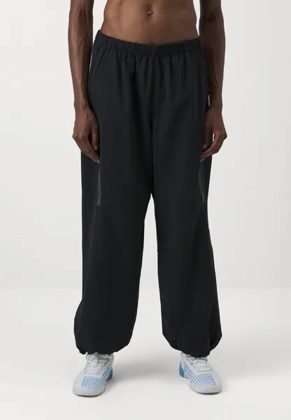 Спортивные брюки UNSTOPPABLE AIRVENT PARACHUTE PANT Under Armour, черный