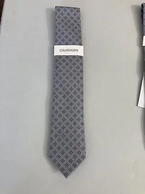 Мужской серый галстук CALVIN KLEIN с ромбовидным узором в горошек
