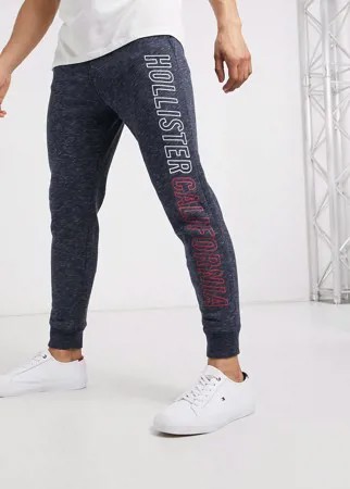 Джоггеры скинни с принтом Hollister-Темно-синий