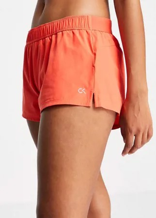 Оранжевые спортивные шорты от комплекта Calvin Klein Performance-Оранжевый цвет