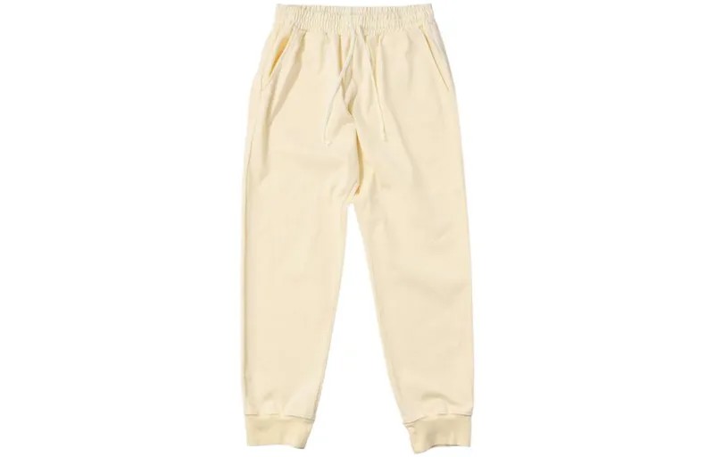 Трикотажные спортивные штаны унисекс бежевый New Balance, цвет Apricot Cream