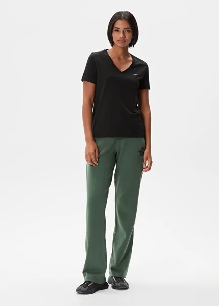 Зеленые женские спортивные штаны-клеш Lacoste