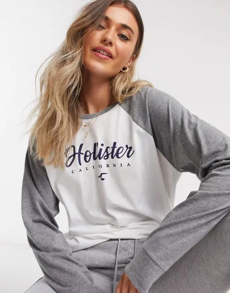 Серый лонгслив с контрастными рукавами Hollister