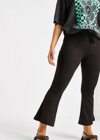 Коричневые фактурные расклешенные брюки с завязкой на поясе ASOS DESIGN Petite-Коричневый