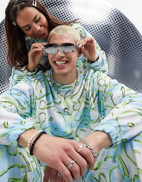 Сине-белый свитшот унисекс с принтом «смайлик» по всей поверхности ASOS DESIGN Smiley Collab