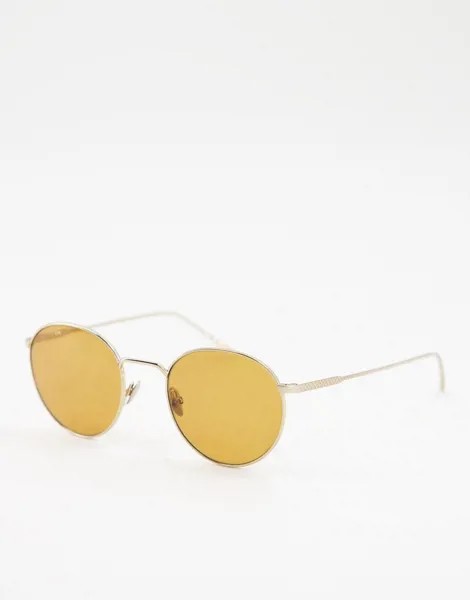 Круглые солнцезащитные очки в золотистой оправе Lacoste-Золотистый