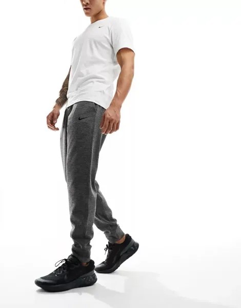 Темно-серые зауженные джоггеры Nike Dri-FIT