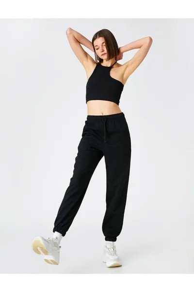 Спортивные брюки Jogger с эластичным карманом на талии Koton, черный