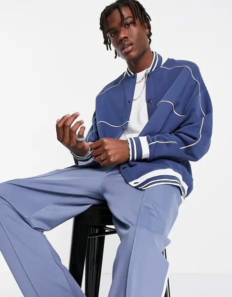 Темно-синий трикотажный бомбер в стиле oversized с окантовкой ASOS DESIGN-Голубой
