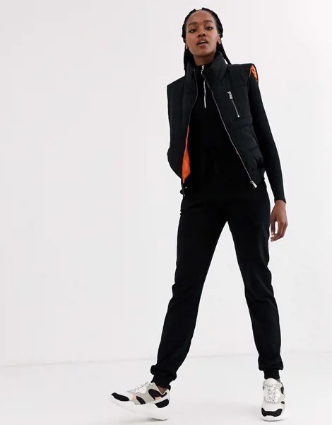 Черный дутый жилет с контрастной подкладкой ASOS DESIGN